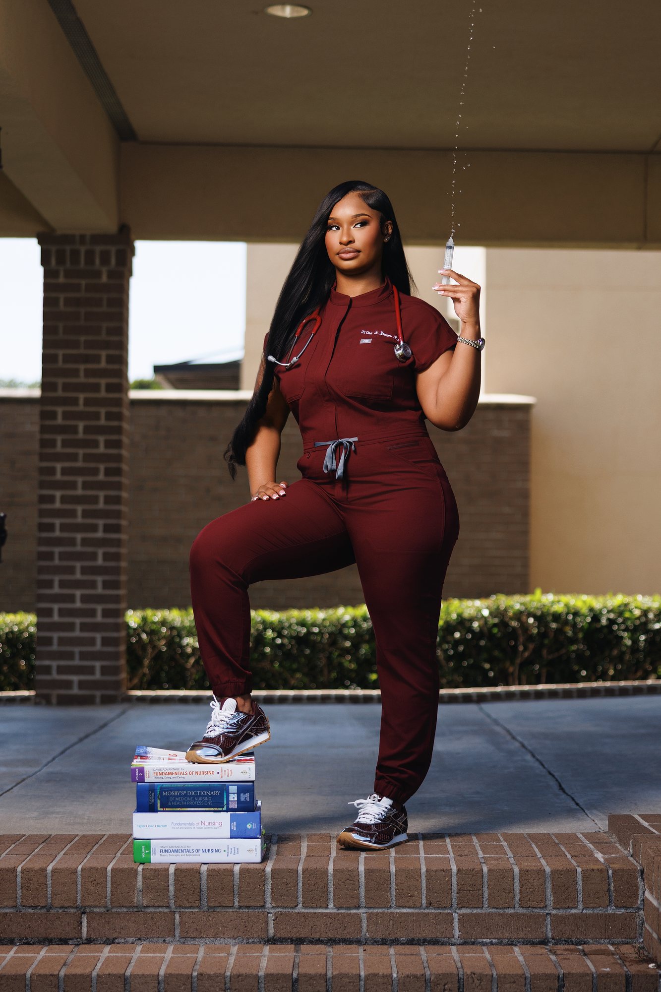 Ti'Ona Y. graduation session by Christian Paul Studios