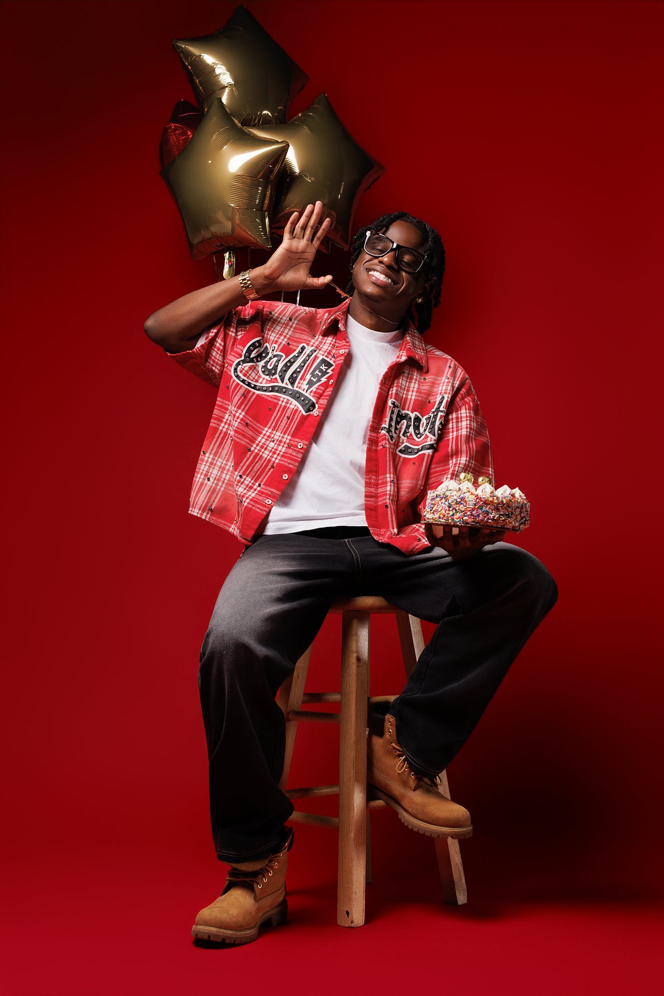 DeMarcell F. graduation session by Christian Paul Studios