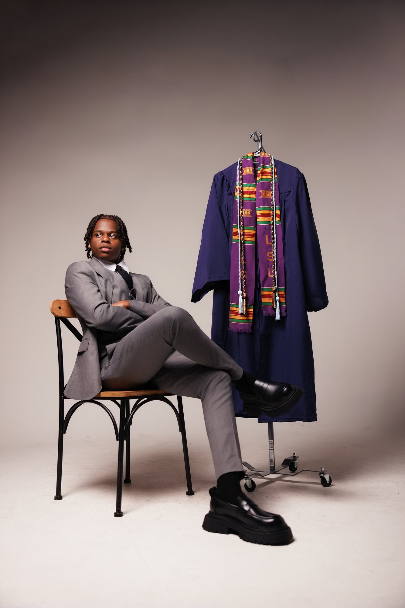 DeMarcell F. graduation session by Christian Paul Studios
