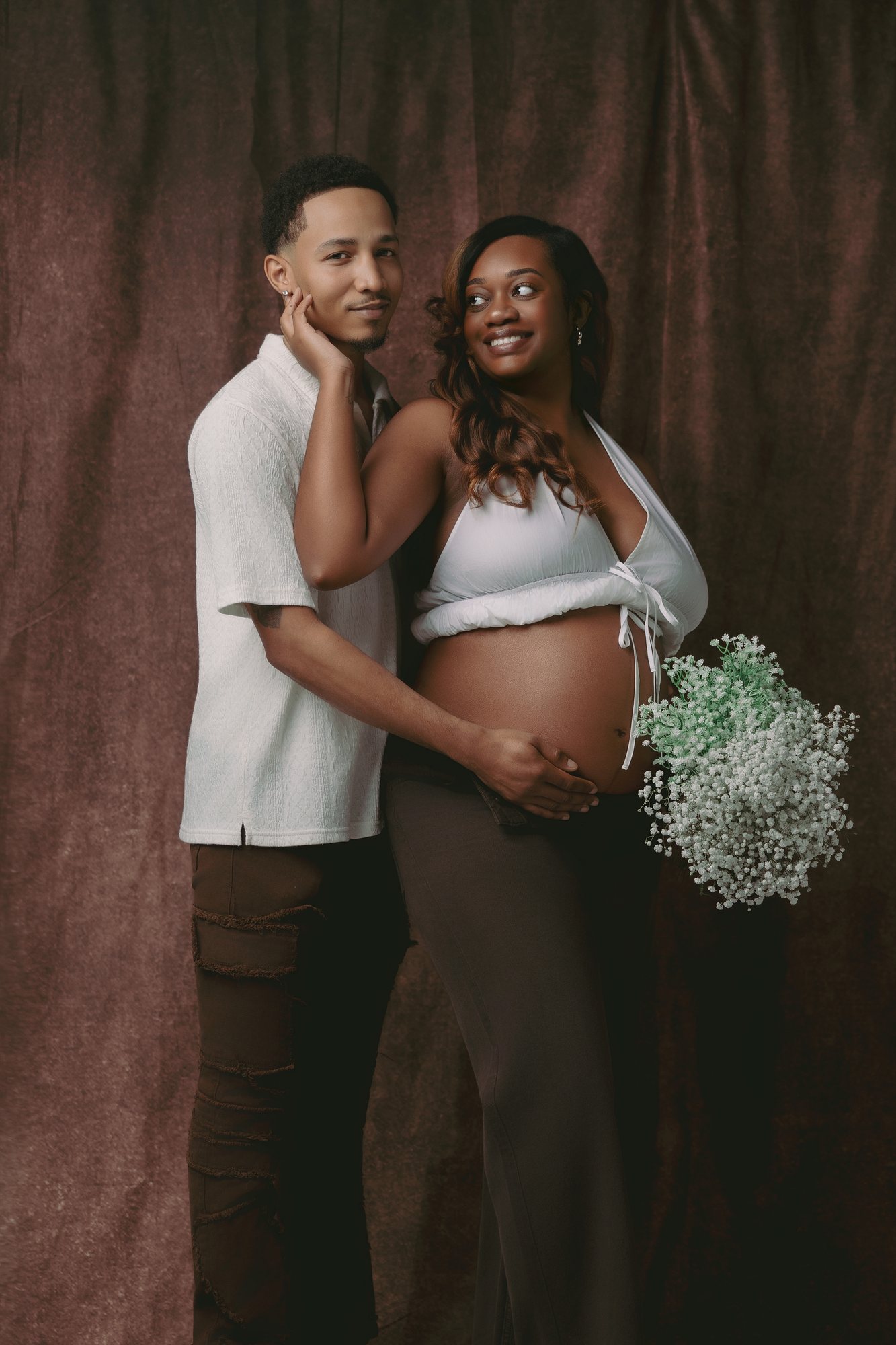 Deante + Carlos maternity portrait by Christian Paul Studios