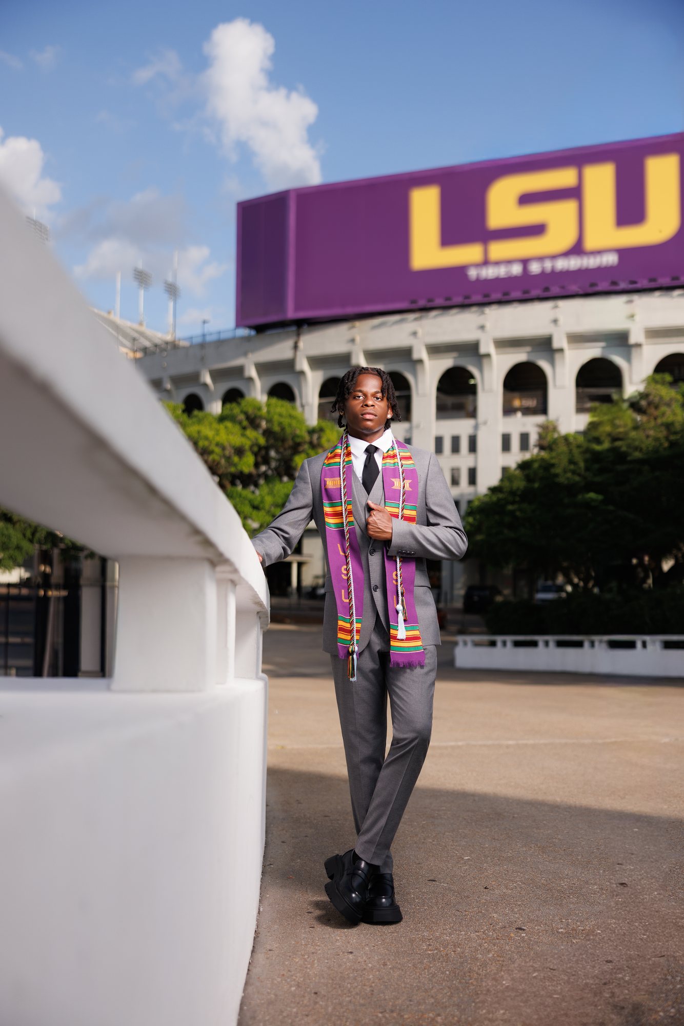 DeMarcell F. graduation session by Christian Paul Studios