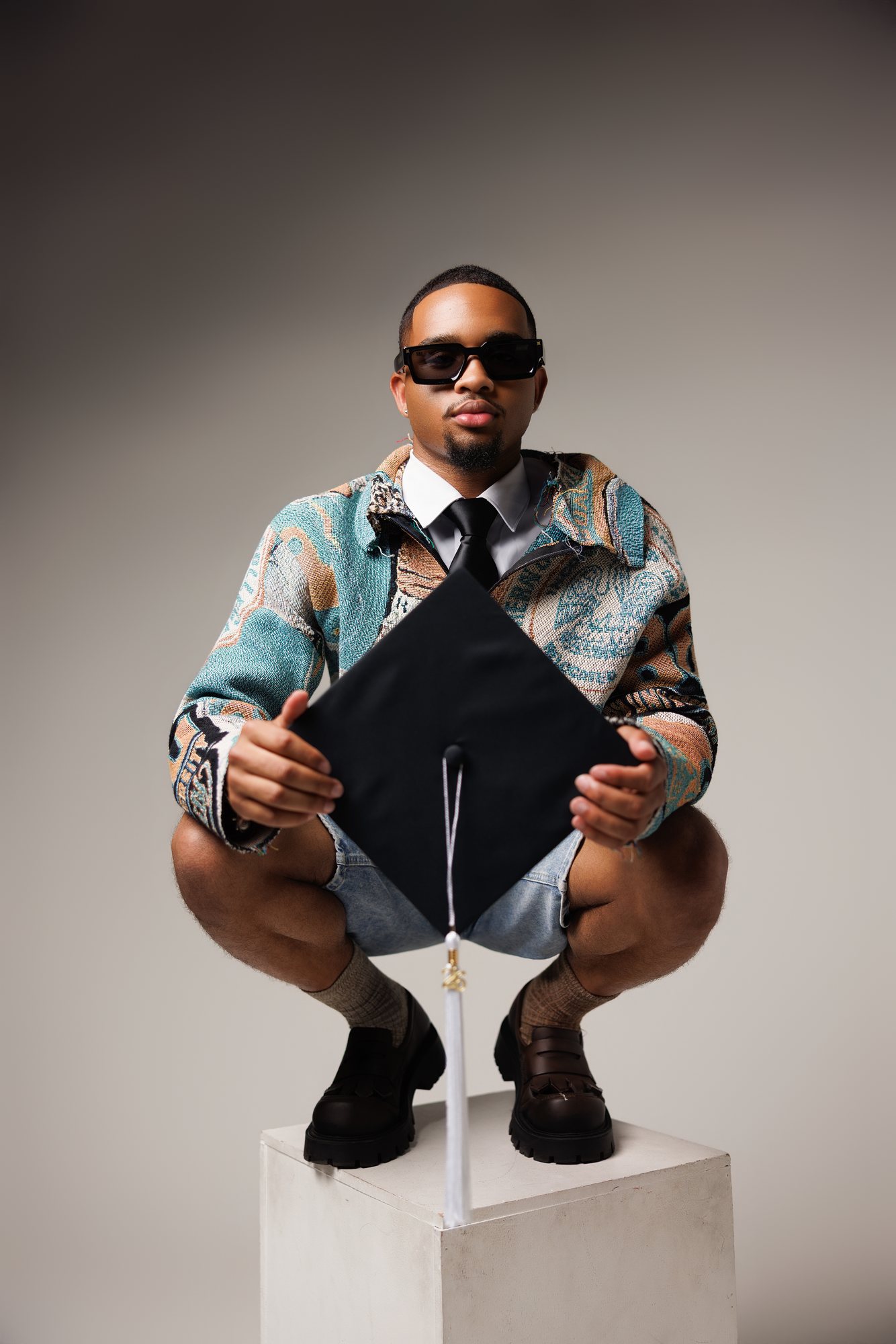 Vernell J. graduation session by Christian Paul Studios