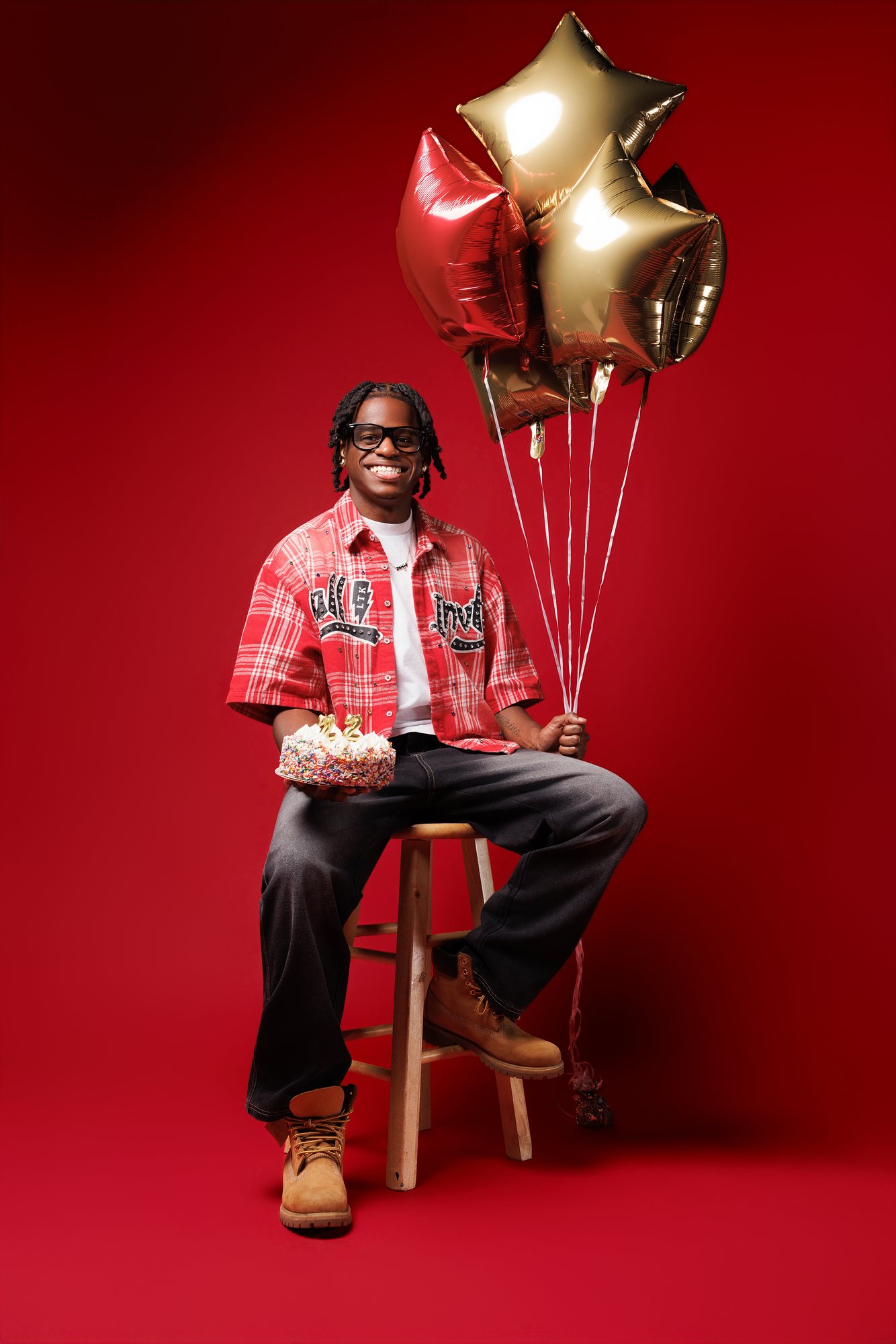 DeMarcell F. graduation session by Christian Paul Studios