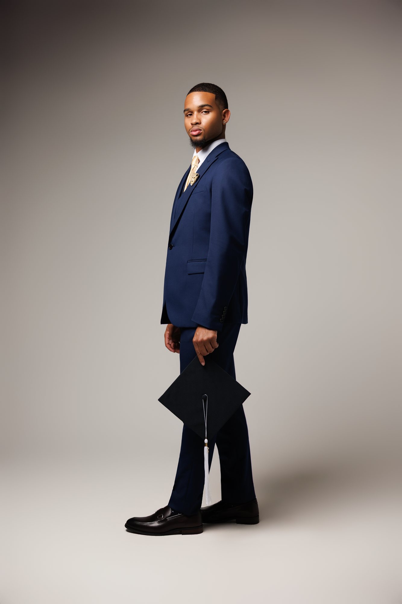 Vernell J. graduation session by Christian Paul Studios
