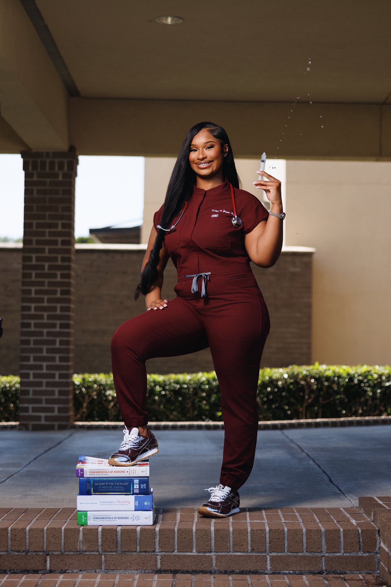 Ti'Ona Y. graduation session by Christian Paul Studios