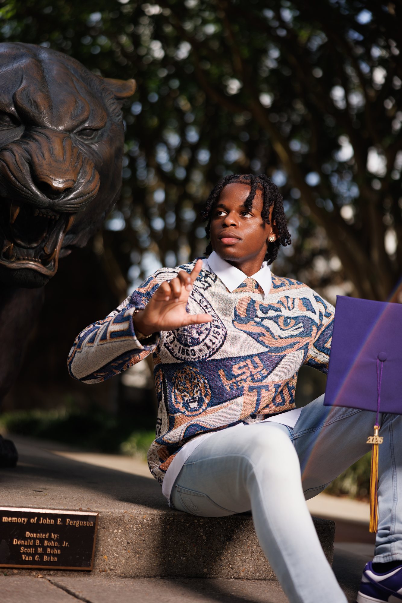 DeMarcell F. graduation session by Christian Paul Studios
